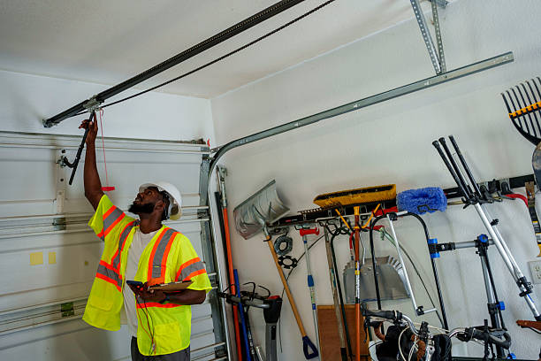 Professional Garage Door Panel Replacement technician working in Iowa Park, TX